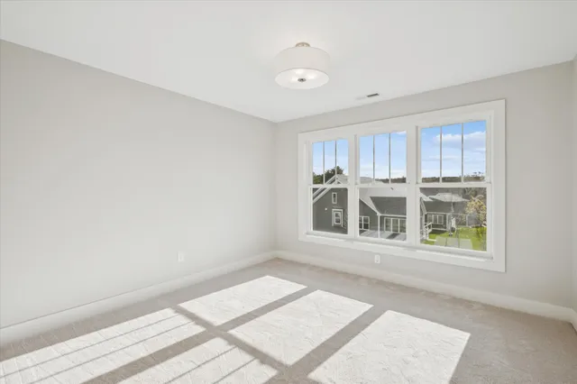 a view of a room with a window