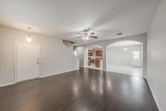 swimming pool view with a seating space