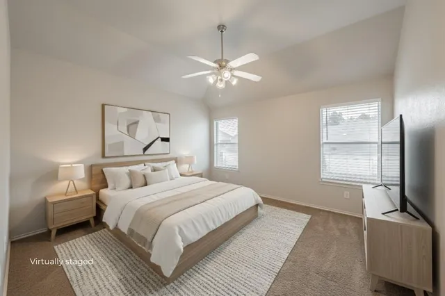 a dining room with furniture a chandelier and window