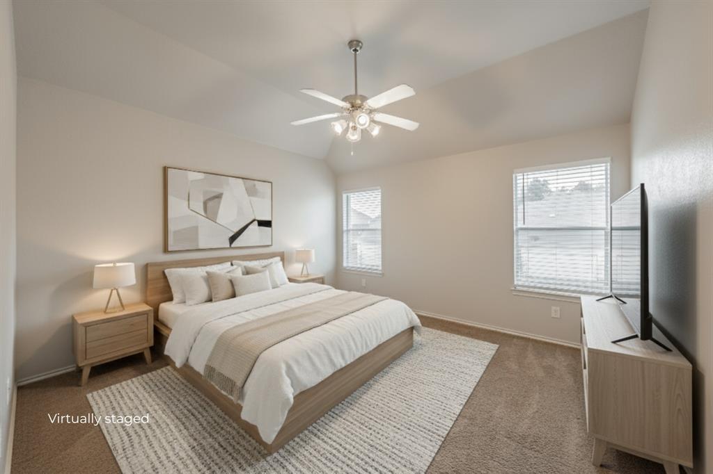 5446 Prairie Lane Grand Prairie, TX 75052 - Photo 5 of 39 a bedroom with a bed wooden floor and window
