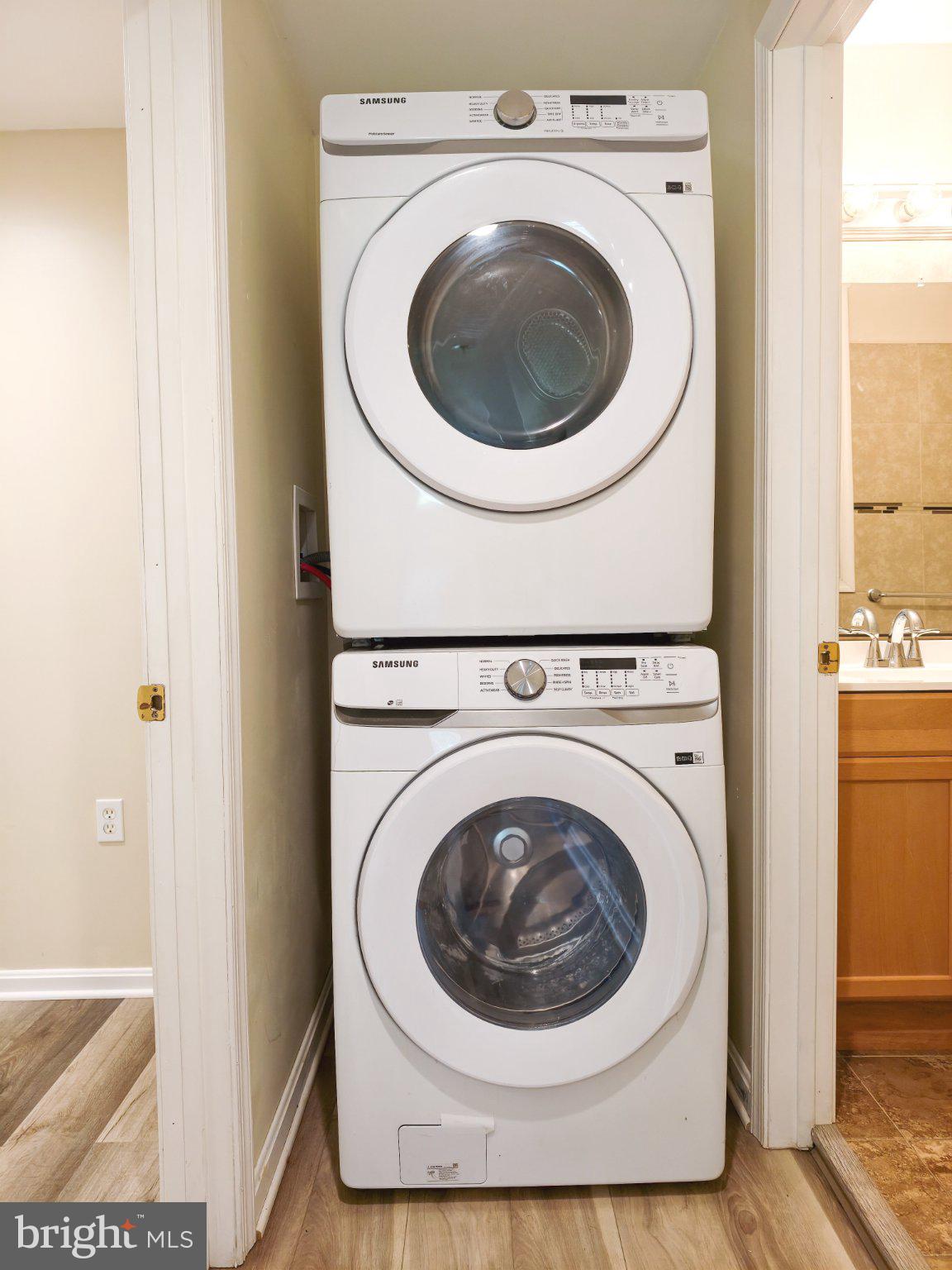 6066 Shady Side Road Shady Side, MD 20764 - Photo 55 of 61 Efficient laundry setup in a cozy nook.