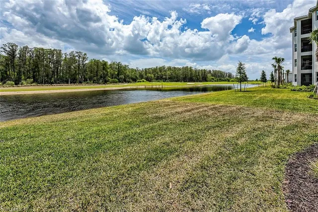 a view of a golf course with a lake