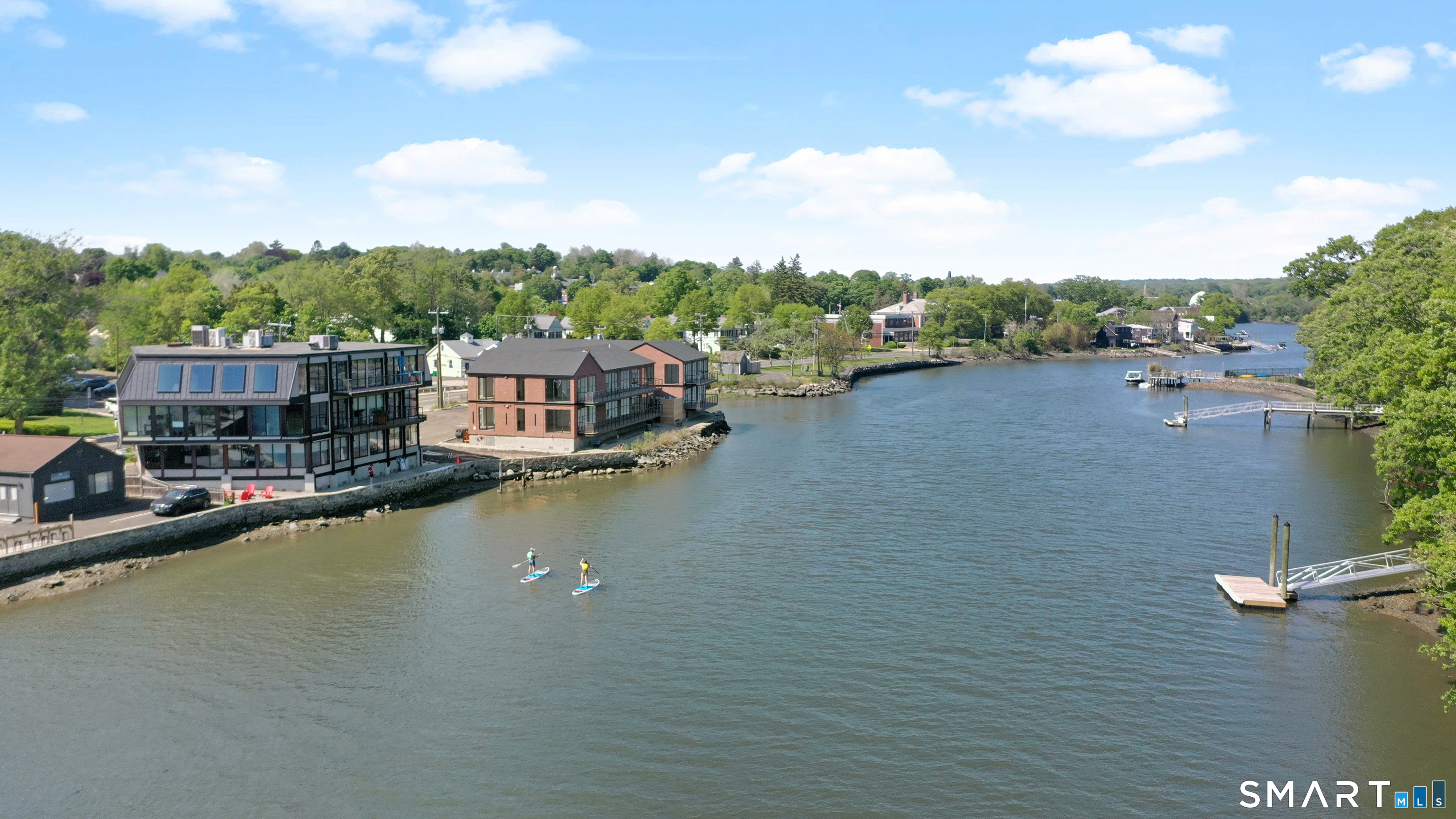 253 Riverside Avenue, Unit 102 Westport, CT 06880 - Photo 11 of 14 a view of a lake with houses