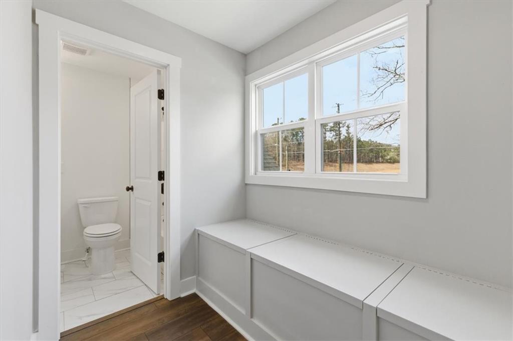127 Old Alabama Road Southeast Emerson, GA 30137 - Photo 28 of 47 a bathroom with a sink a toilet and a window