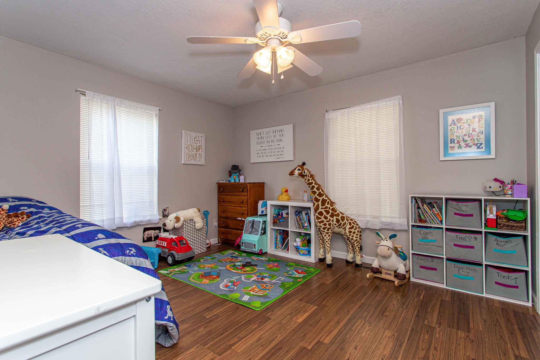 830 Collins Road Blaine, TN 37709 - Photo 19 of 34 a bedroom with furniture and a book shelf