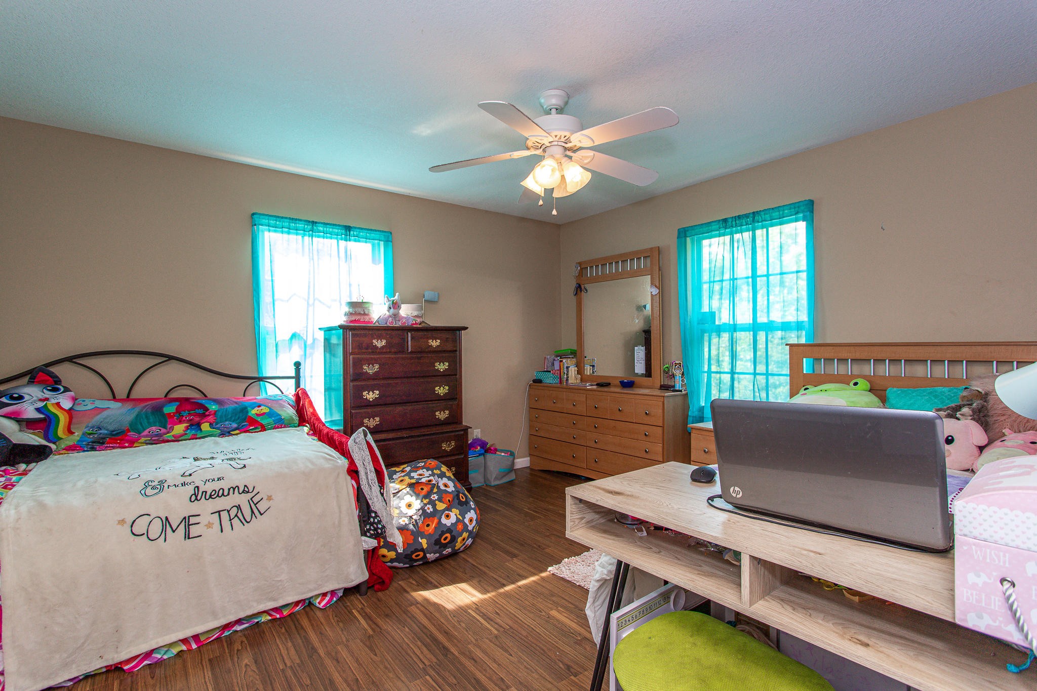 830 Collins Road Blaine, TN 37709 - Photo 24 of 34 a bedroom with furniture and a wooden floor