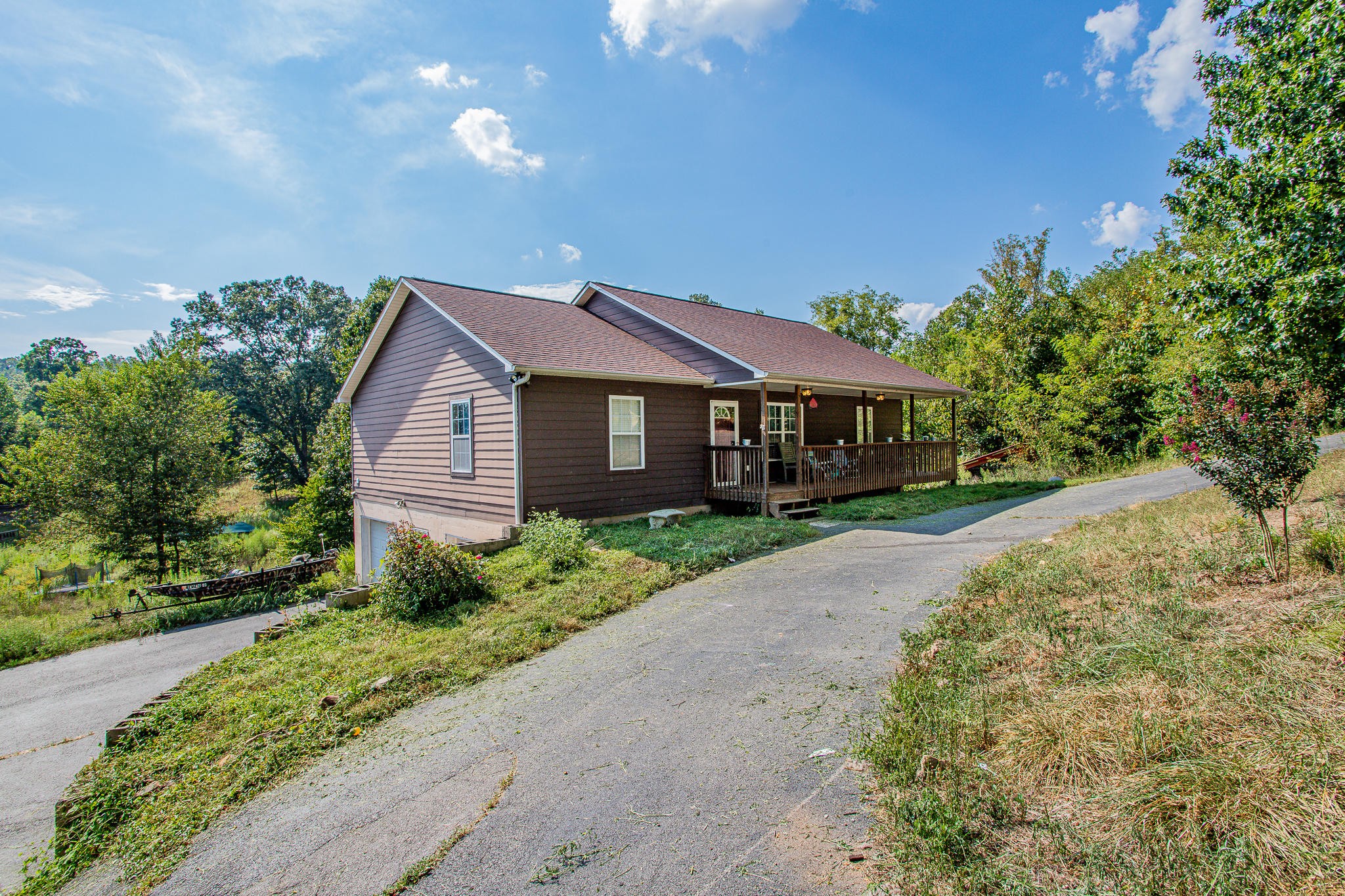 830 Collins Road Blaine, TN 37709 - Photo 29 of 34 a front view of a house with a yard