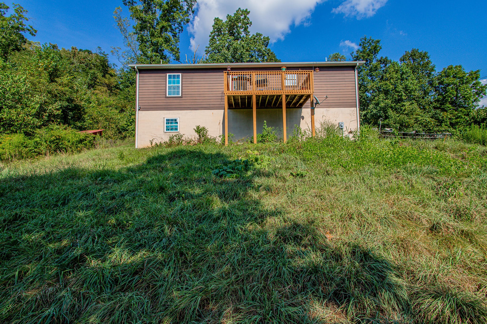 830 Collins Road Blaine, TN 37709 - Photo 31 of 34 an aerial view of a house with balcony