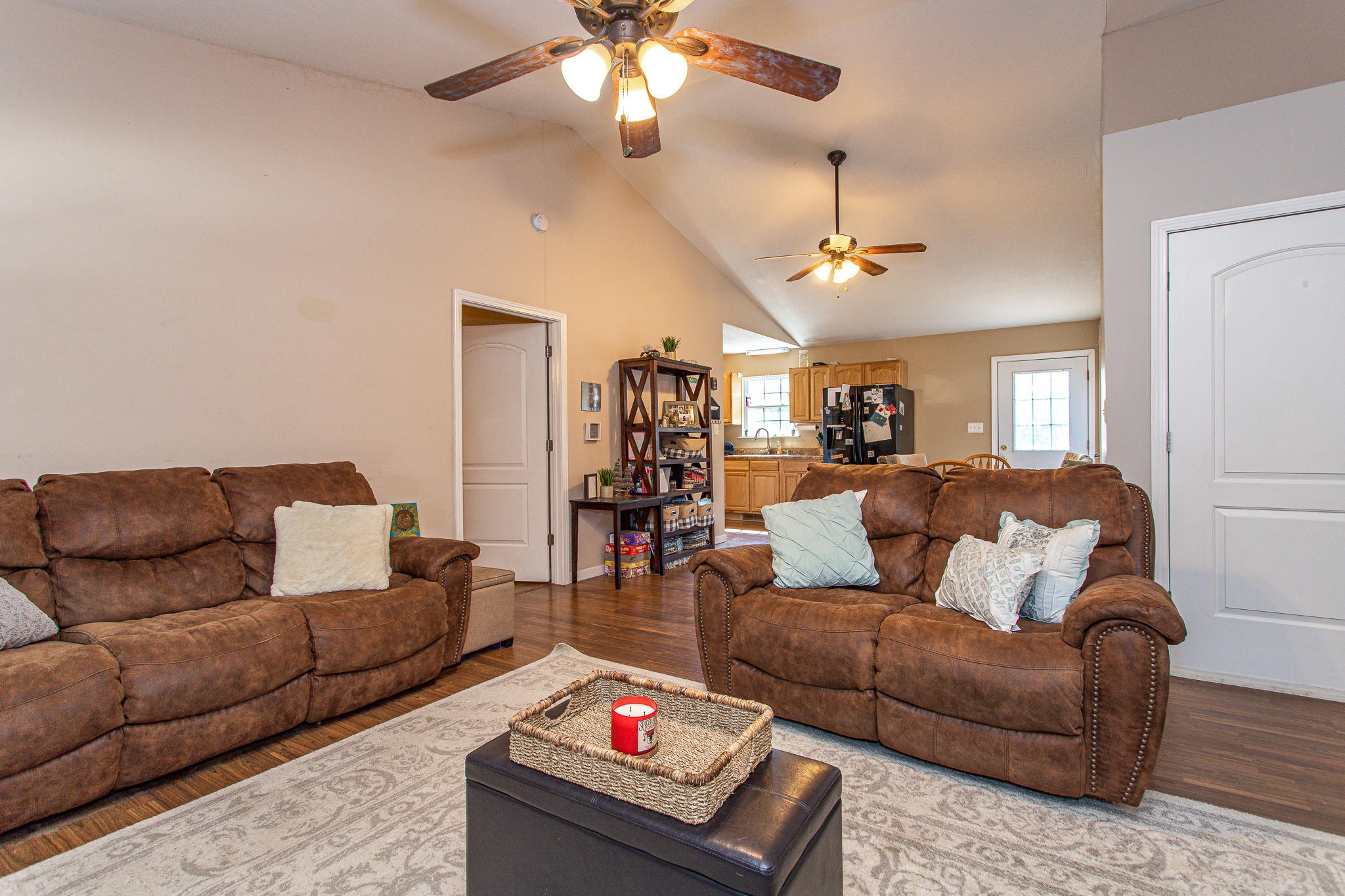 830 Collins Road Blaine, TN 37709 - Photo 7 of 34 a living room with furniture and a chandelier