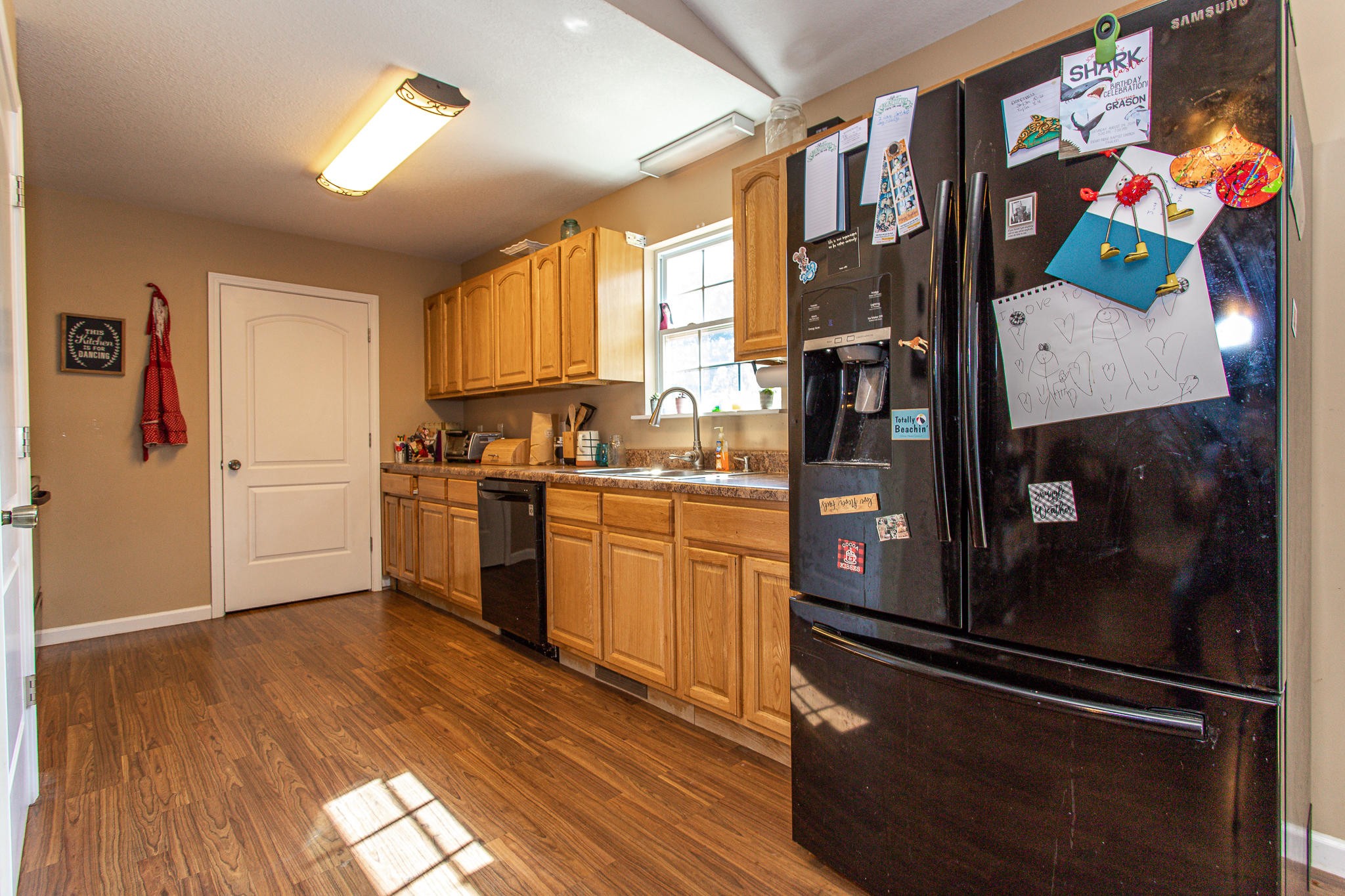 830 Collins Road Blaine, TN 37709 - Photo 9 of 34 a kitchen with stainless steel appliances granite countertop a refrigerator and a sink