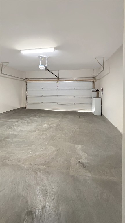 133 Langtry Lane Jarrell, TX 76537 - Photo 27 of 27 View of garage: including water softener and sprinkler system.