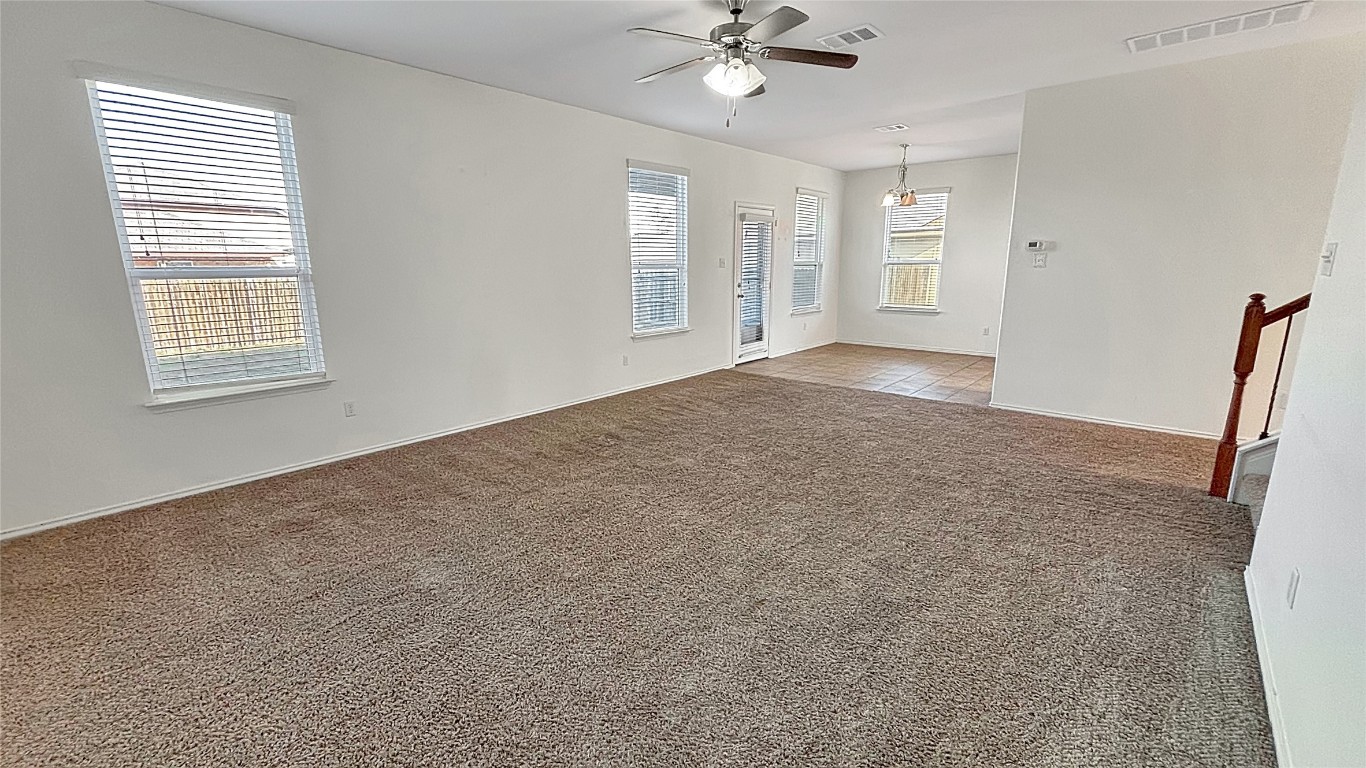 133 Langtry Lane Jarrell, TX 76537 - Photo 5 of 27 Living room- large open space with lots of light connecting to the breakfast area.