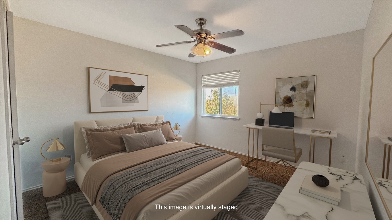 133 Langtry Lane Jarrell, TX 76537 - Photo 8 of 27 One of 4 spacious bedrooms. Virtually staged with a queen bed to show you how the space can be use. Large rooms with walk in closet. Virtually staged.