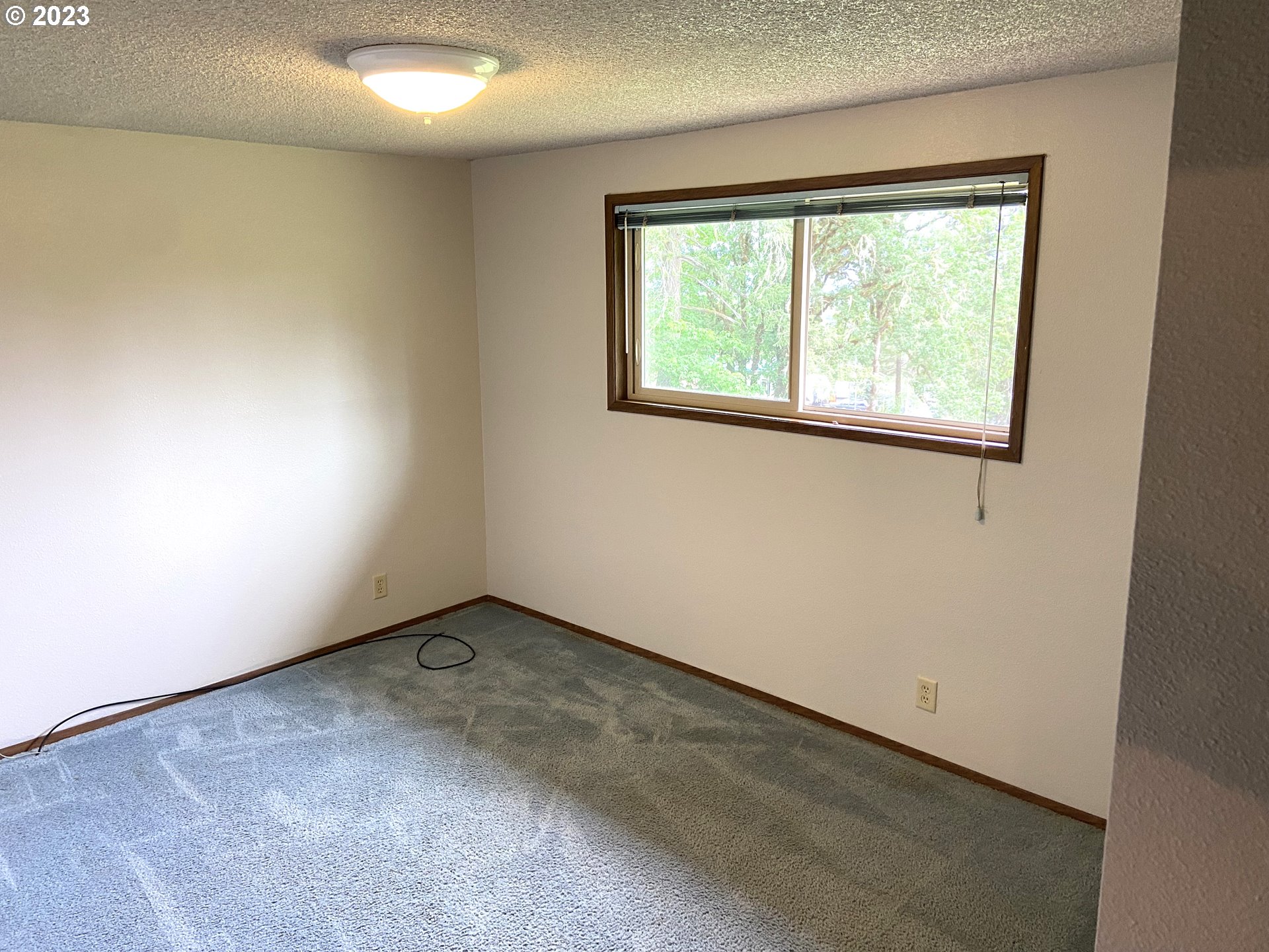 7905 South C Street Springfield, OR 97478 - Photo 16 of 28 an empty room with a window