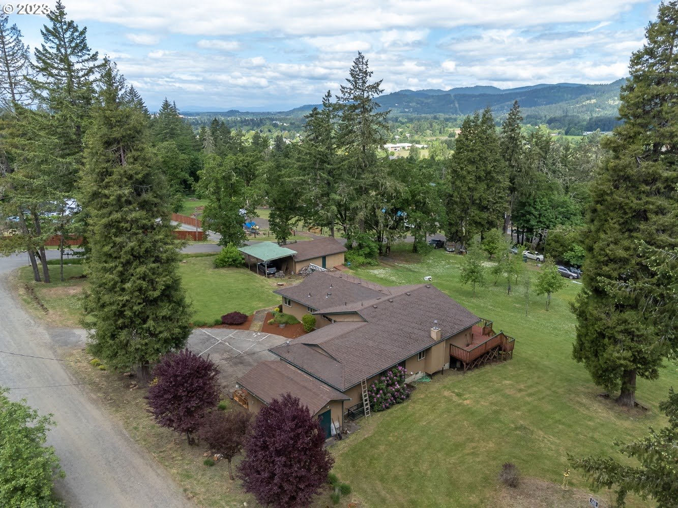 7905 South C Street Springfield, OR 97478 - Photo 26 of 28 an aerial view of a house with yard