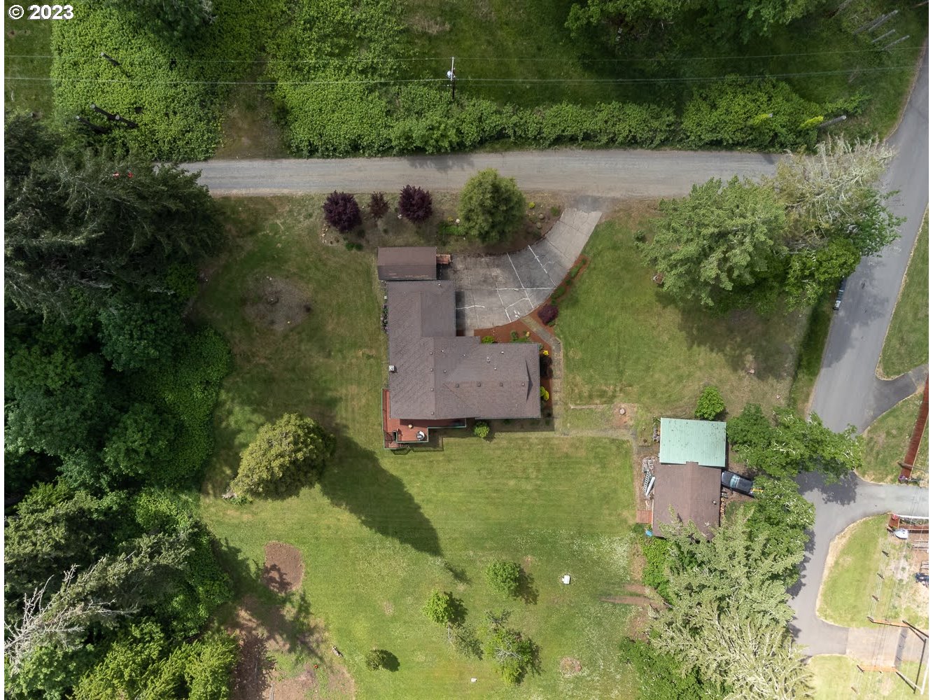7905 South C Street Springfield, OR 97478 - Photo 28 of 28 an aerial view of a house with a yard