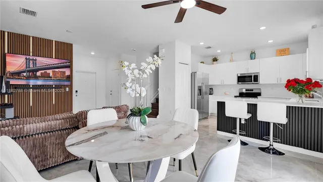a view of a dining room with furniture