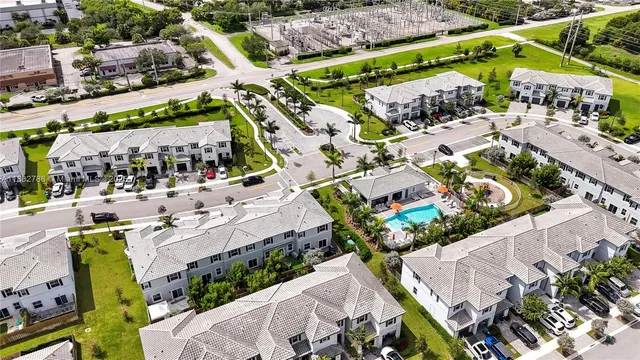 an aerial view of a building with outdoor space