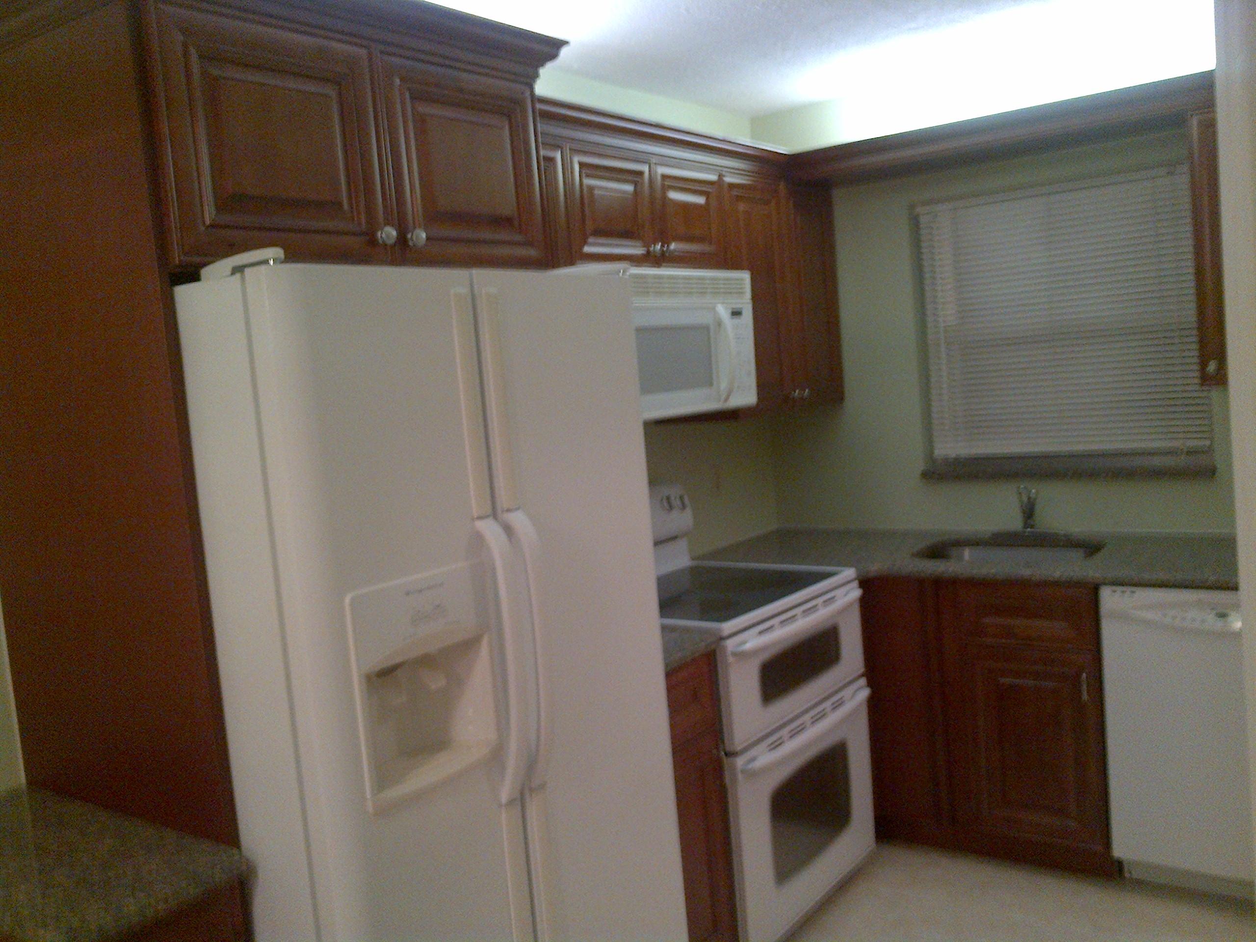 9855 Sandalfoot Boulevard, Unit 303 Boca Raton, FL 33428 - Photo 5 of 10 sandal kitchen2