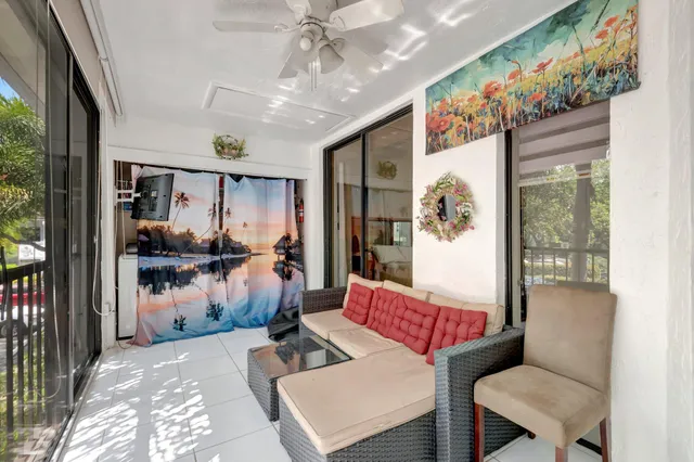 a view of a car park in front of house