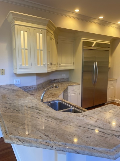 4775 Karns Road Lisle, IL 60532 - Photo 9 of 29 a kitchen with granite countertop a sink and a stove