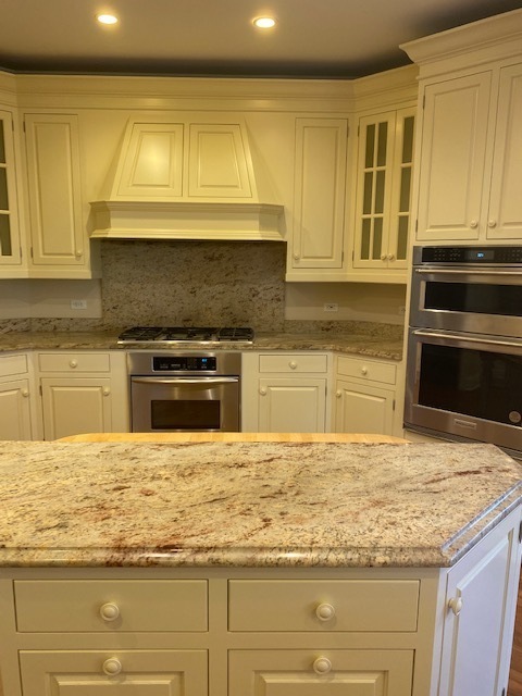 4775 Karns Road Lisle, IL 60532 - Photo 10 of 29 a kitchen with granite countertop sink cabinets and stainless steel appliances