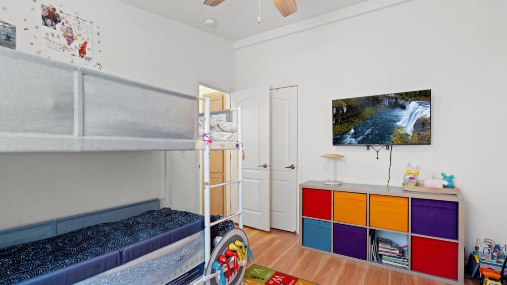 7495 Oakland Road, Unit 23 La Mesa, CA 91942 - Photo 15 of 24 a living room with furniture and a flat screen tv