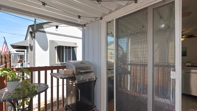 a front view of a house with wooden fence