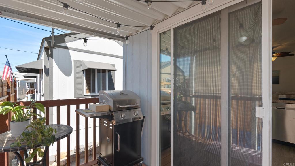 7495 Oakland Road, Unit 23 La Mesa, CA 91942 - Photo 16 of 24 a front view of a house with wooden fence