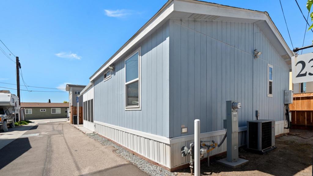 7495 Oakland Road, Unit 23 La Mesa, CA 91942 - Photo 19 of 24 a backyard of a house with seating space