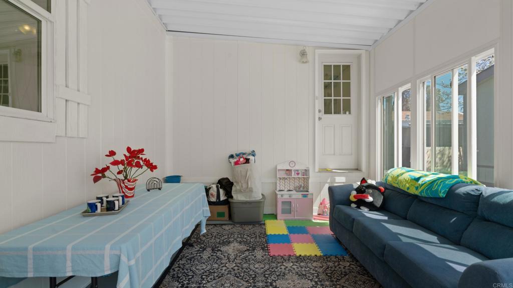 7495 Oakland Road, Unit 23 La Mesa, CA 91942 - Photo 22 of 24 a room with toys and flowers