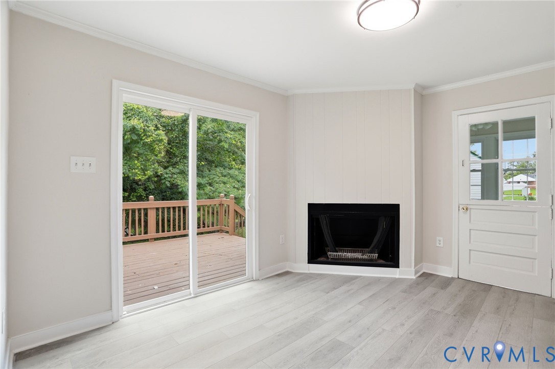 5301 Dalglish Road Richmond, VA 23223 - Photo 14 of 42 Living area featuring light wood-finish flooring,
