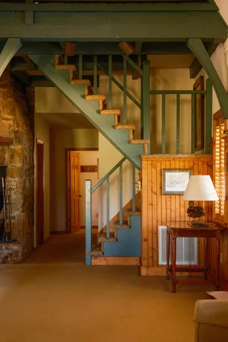 a view of a lake with houses in the back