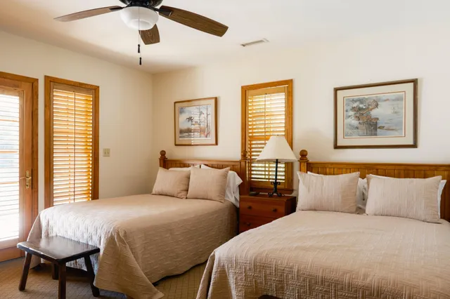a view of swimming pool with trees