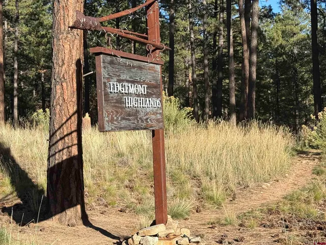 a sign on the side of a road
