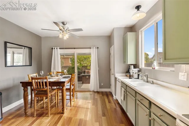 a kitchen with a sink and cabinets