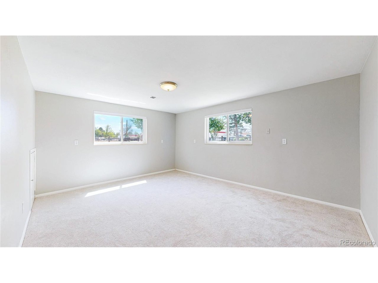 9395 West 45th Avenue Wheat Ridge, CO 80033 - Photo 26 of 48 a open hall with a window