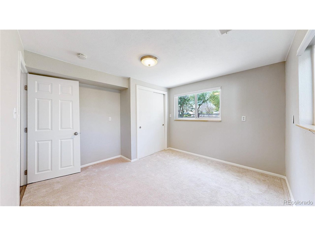 9395 West 45th Avenue Wheat Ridge, CO 80033 - Photo 34 of 48 a open hall with a window