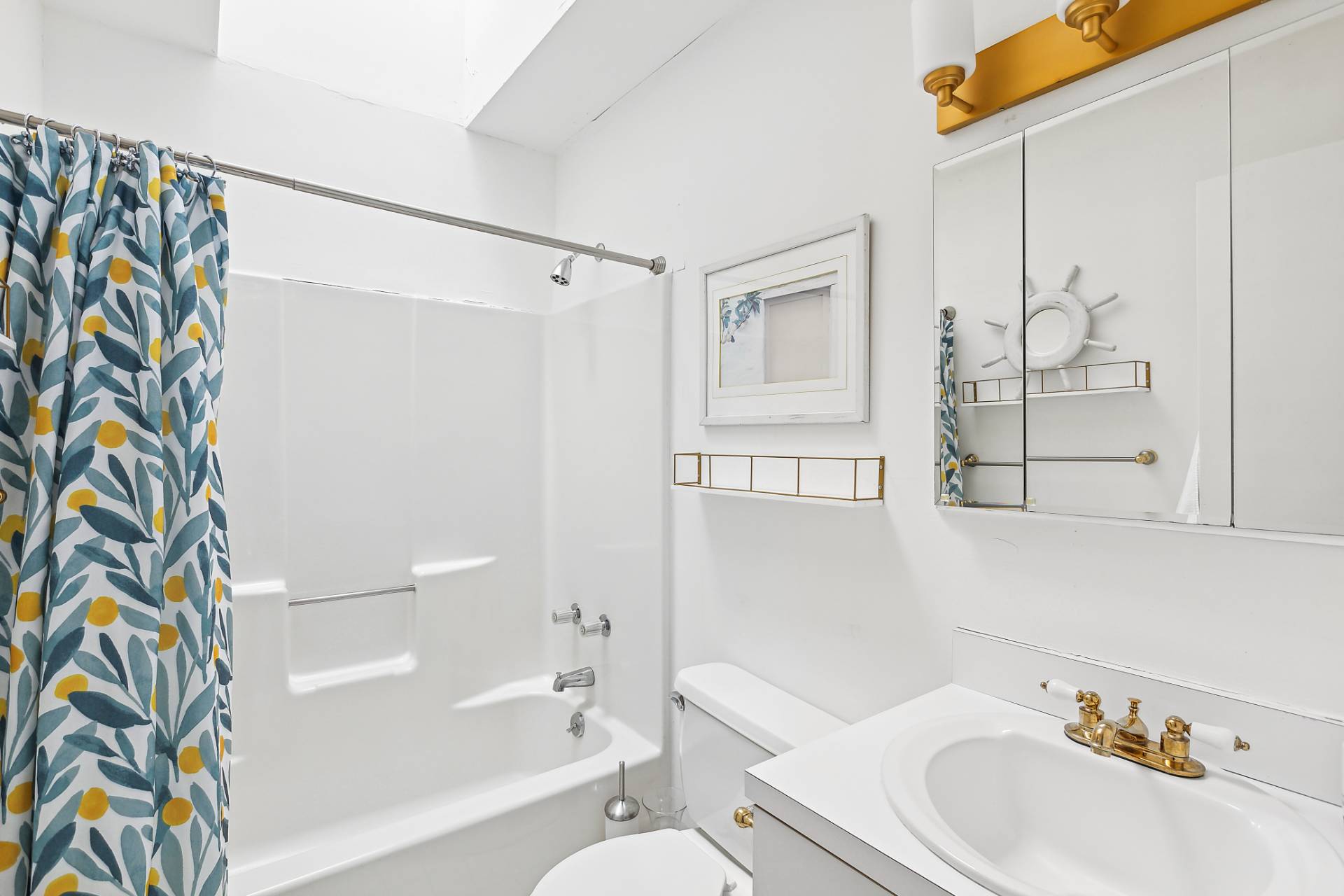 18 Whooping Hollow Road East Hampton, NY 11937 - Photo 12 of 15 a bathroom with a sink a toilet and shower