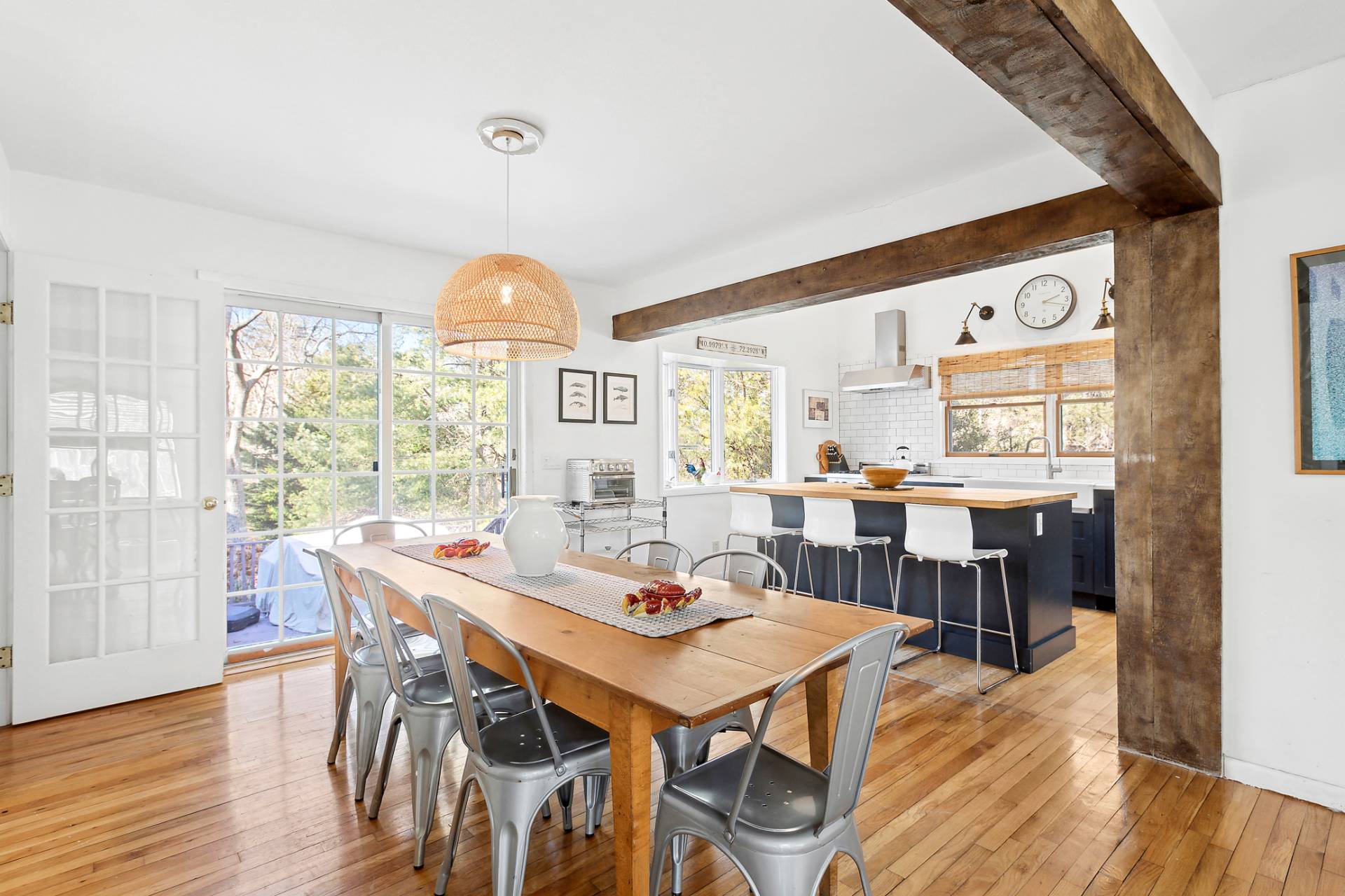 18 Whooping Hollow Road East Hampton, NY 11937 - Photo 5 of 15 a view of a dining room with furniture window and wooden floor