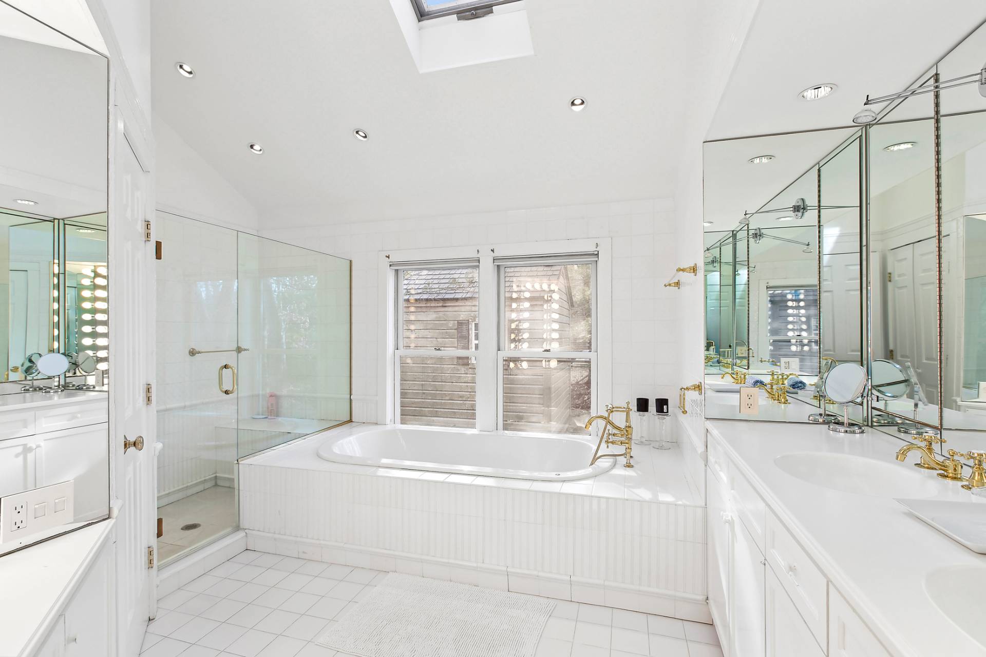 18 Whooping Hollow Road East Hampton, NY 11937 - Photo 8 of 15 a spacious bathroom with sink shower and bathtub