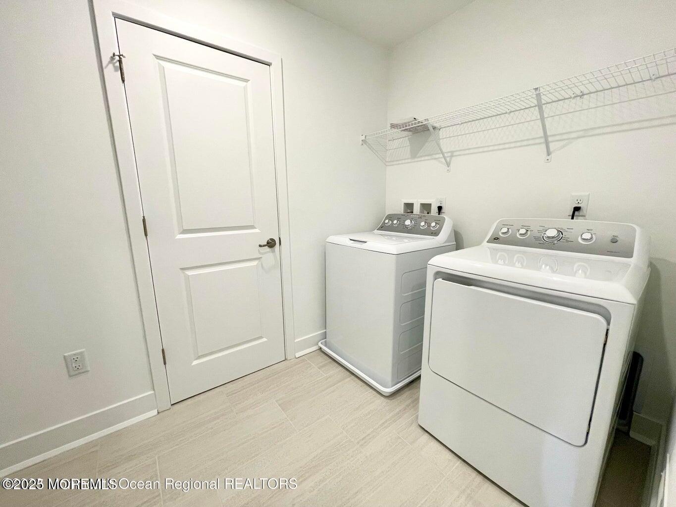 106 Woolley Court Oakhurst, NJ 07755 - Photo 17 of 17 a utility room with dryer and washer