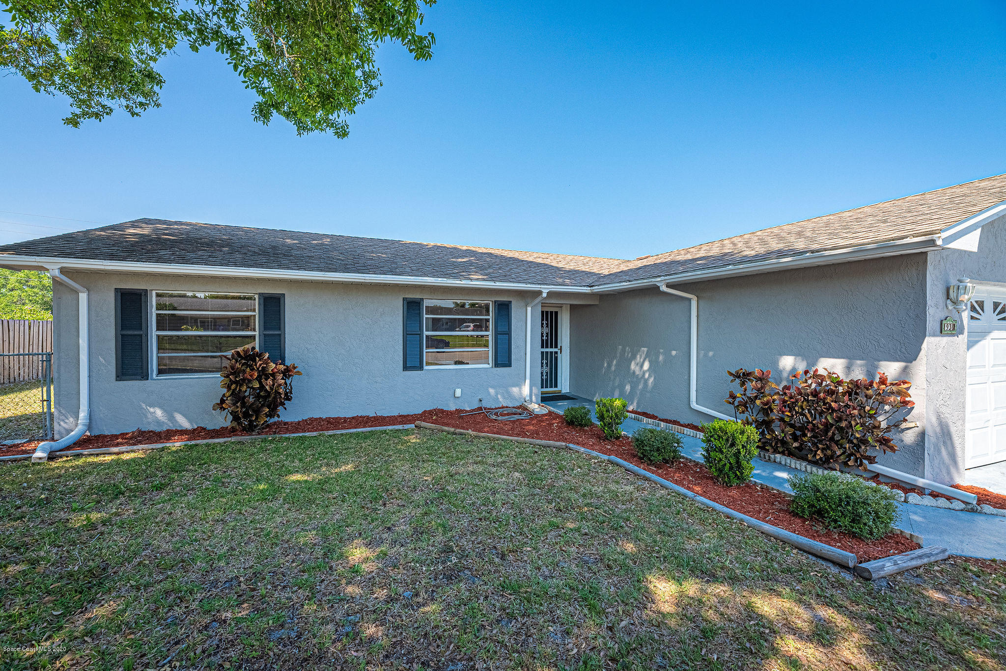 1930 Tallridge Road Melbourne, FL 32935 - Photo 29 of 35 Walkway to Front Door