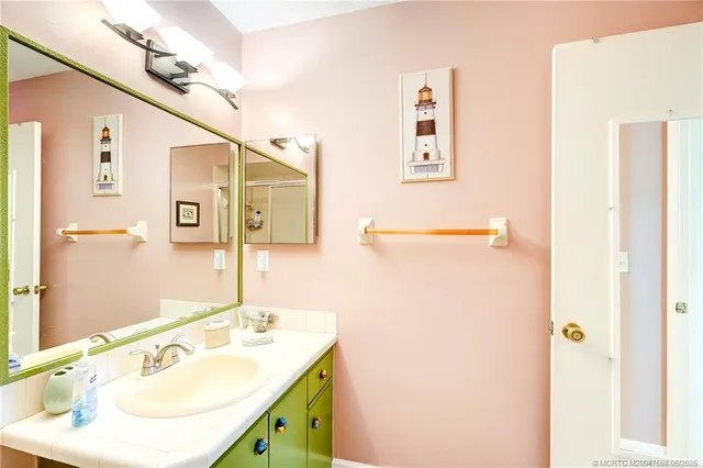 a sign broad in front of a white house