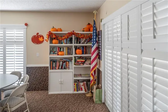 a bathroom with a tub sink and a window