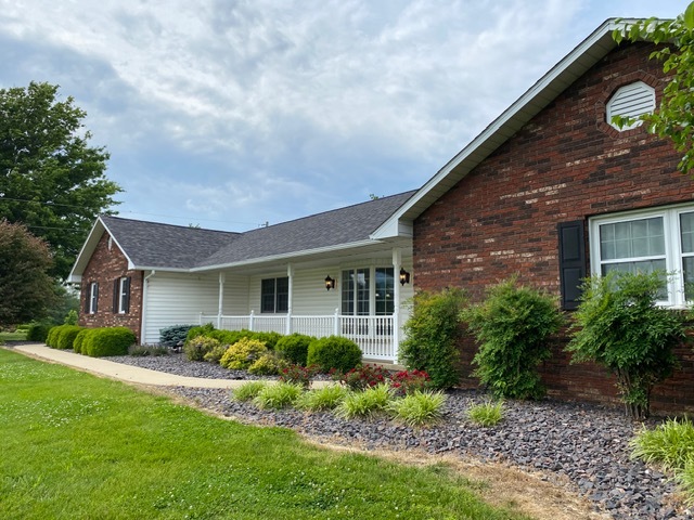 11426 East Radisson Road Mount Vernon, IL 62864 - Photo 36 of 56 a front view of a house with garden
