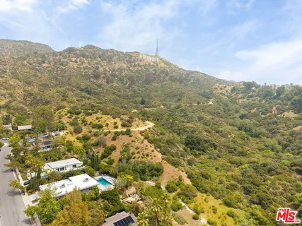 aerial view of a house with a garden