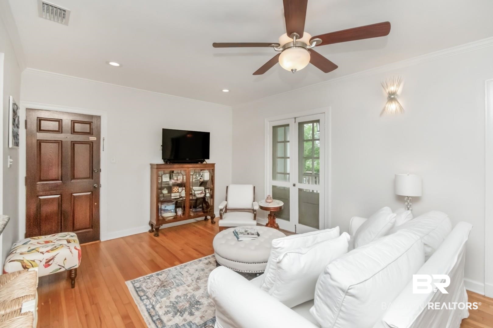 214 Upham Street, Unit 3D Mobile, AL 36607 - Photo 7 of 34 Living room featuring light wood-style floors, ornamental molding, a ceiling fan, french doors, and recessed lighting