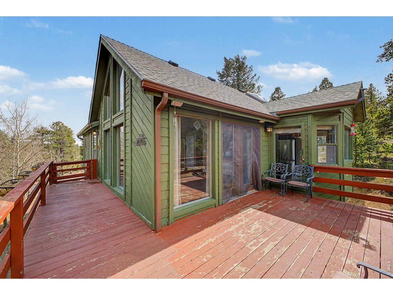 76 Highlands Drive Bailey, CO 80421 - Photo 44 of 49 a view of a house with wooden floor