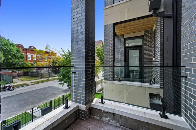 a view of a balcony with an outdoor space
